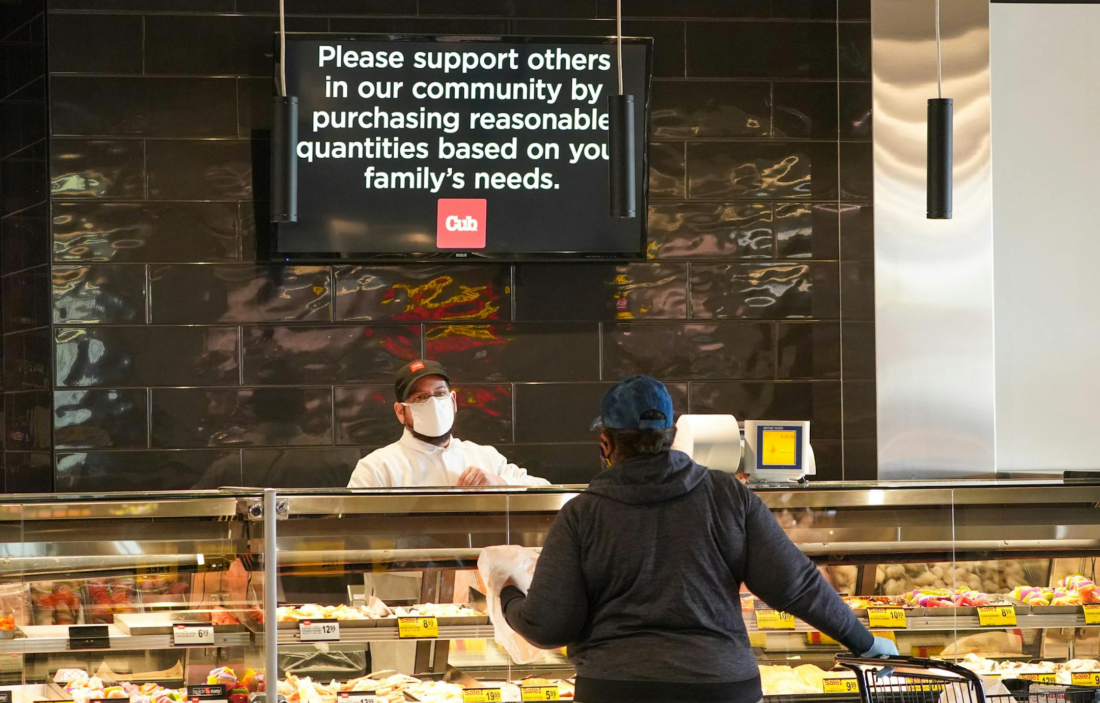 Signs ask customers to purchase a resonable quantity of food at the Minnehaha Cub Foods. ] GLEN STUBBE • glen.stubbe@startribune.com Monday, May 4, 2020