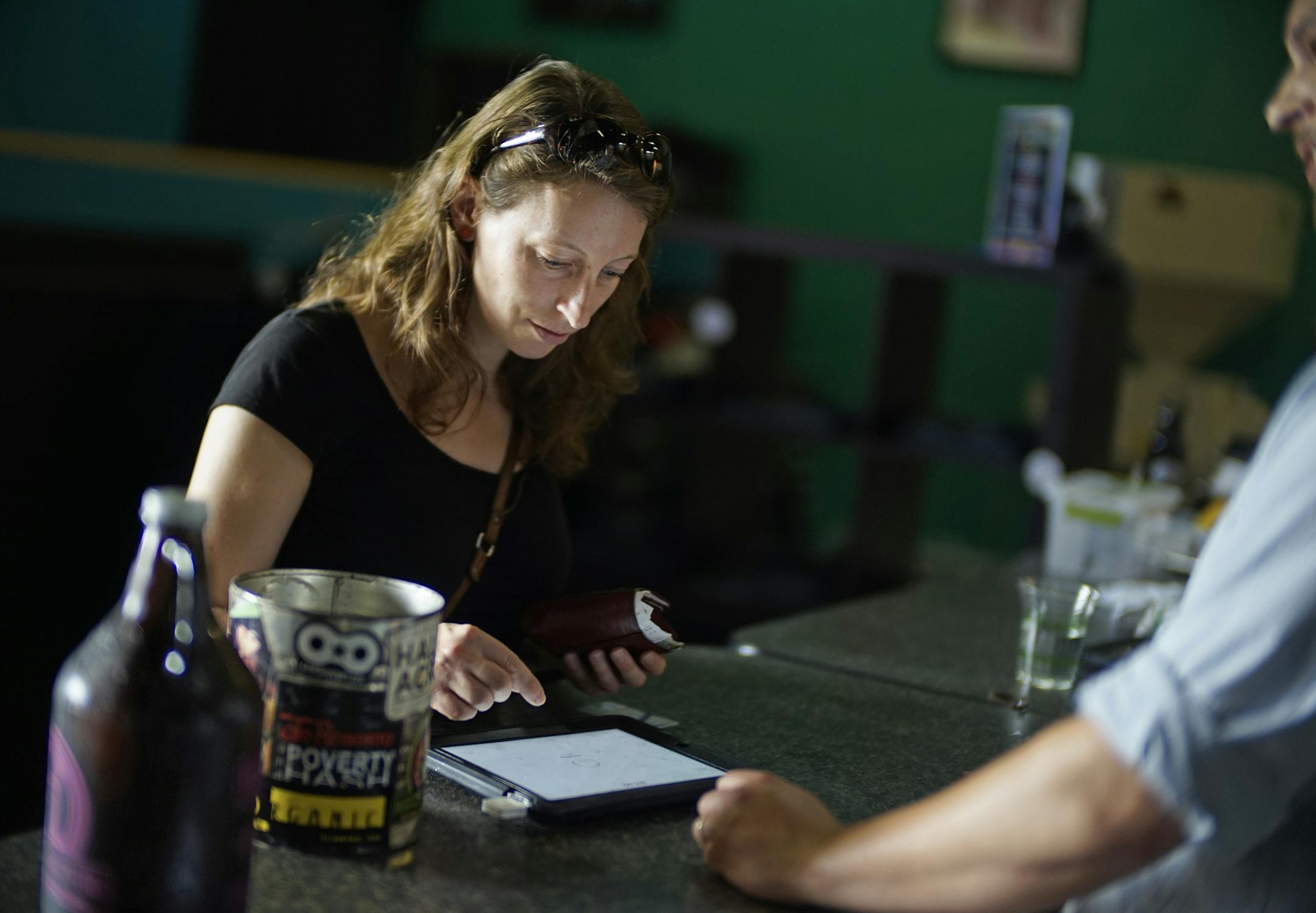 At Harriet Brewing, Maud Meijers purchased a growler of Wodan Weizen. Purchasing a growler on Sunday is now legal in Minnesota. ] Richard Tsong-Taatarii/rtsong-taatarii@startribune.com