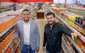 Daniel Hernandez, owner of Colonial Market, left, and Jesus Cavazos, general manager of the mercado's new north Minneapolis location, are getting the
