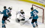 Minnesota Wild goalie Alex Stalock (32) is beaten for a goal on a shot from San Jose Sharks' Brent Burns during the third period of an NHL hockey game