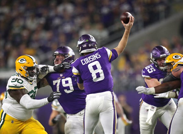 Viking's quarterback Kirk Cousins had good protection early in the third quarter Sunday vs. the Packers.