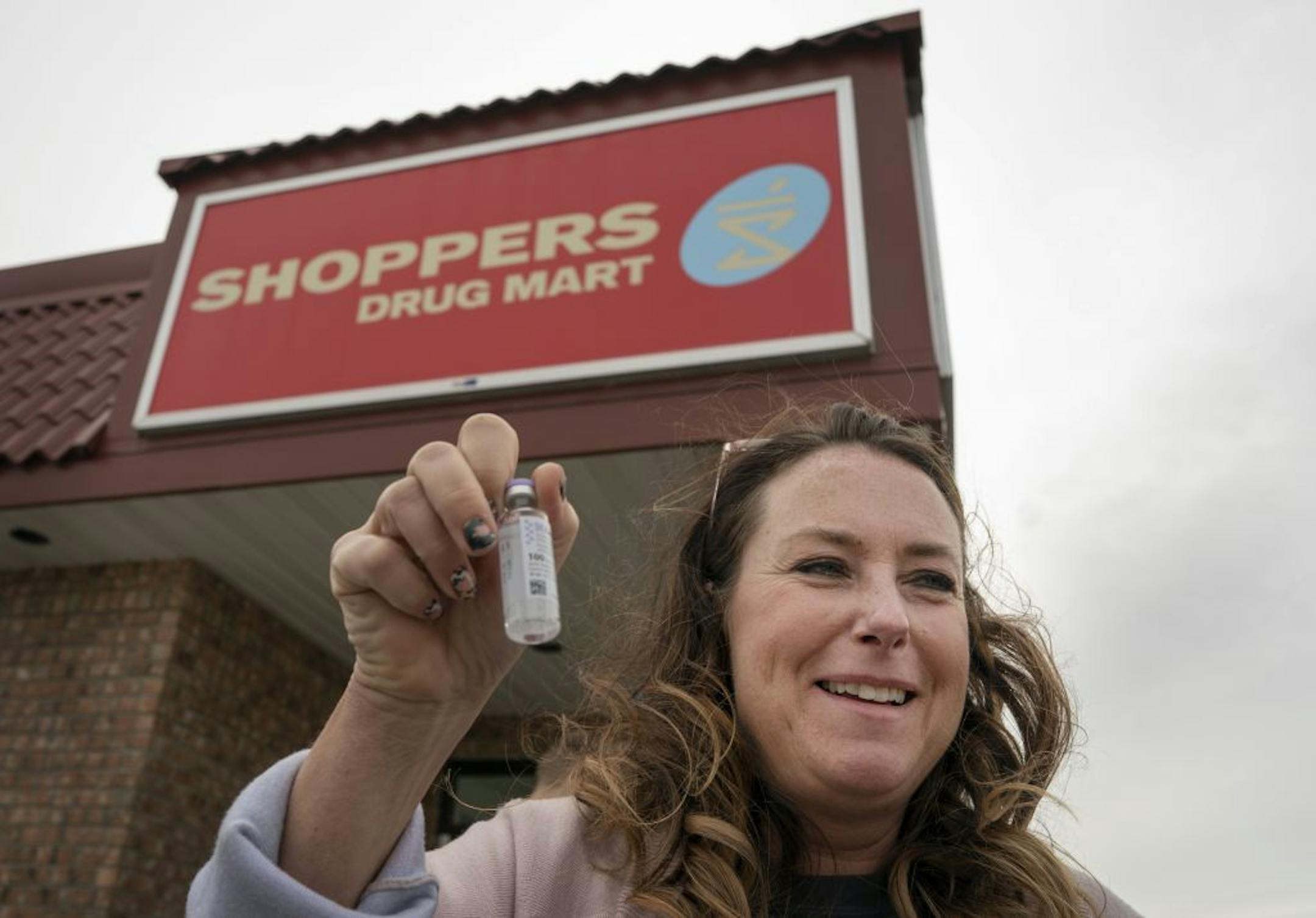Vicky Luedtke held up a vial of insulin outside Shoppers Drug Market pharmacy Saturday May 4, 2019 in Ft. Frances, Ontario.