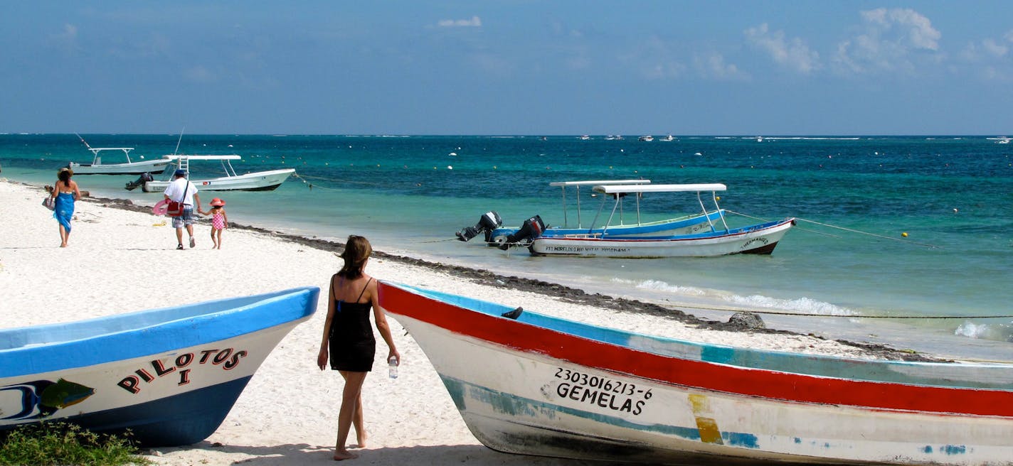 Boats dot the beach in Puerto Morelos, a sleepy town in Mexico&#x2019;s Yucat&#xe1;n.