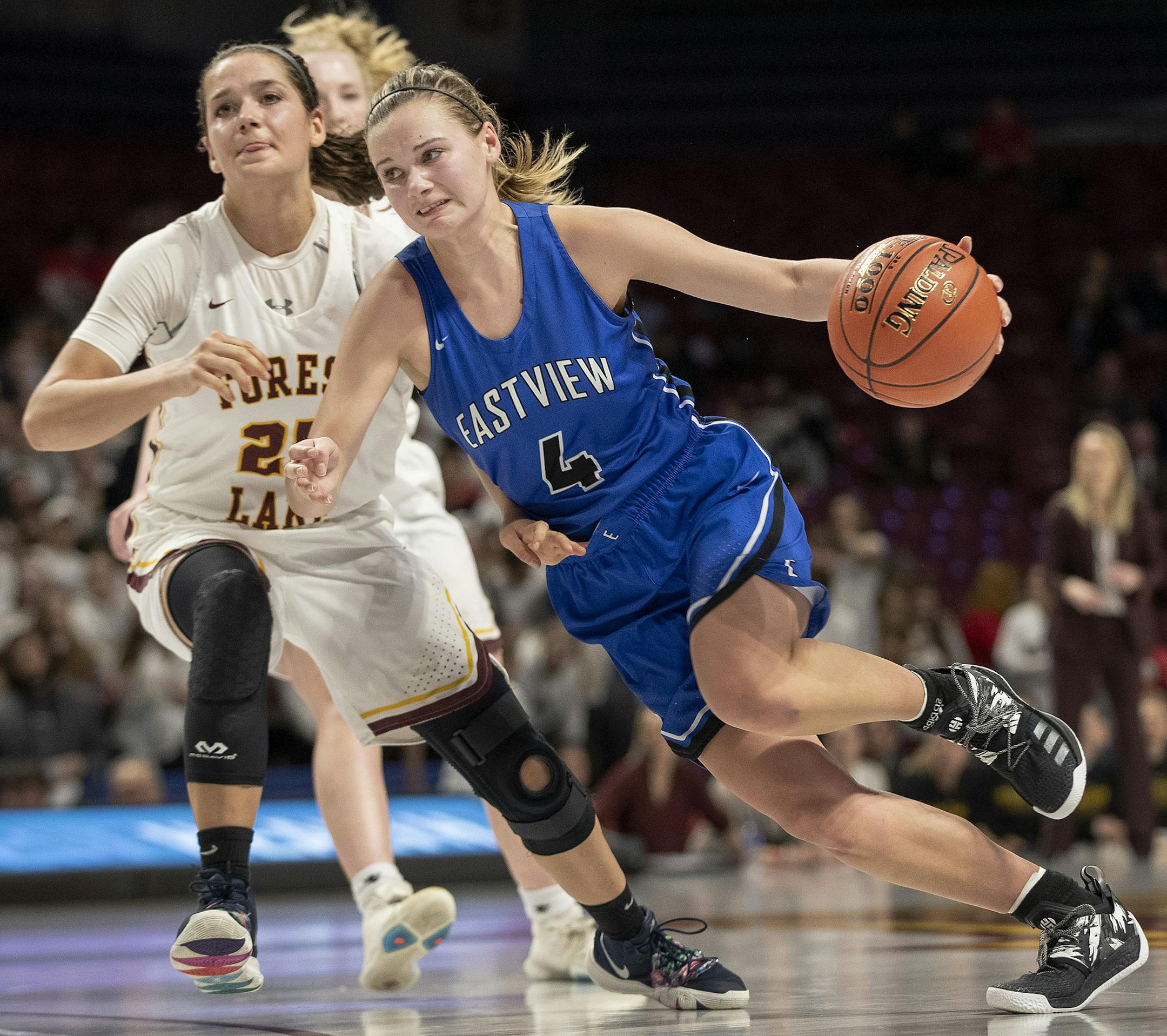 Emma Carpenter (4) of Eastview drove to the basket in the second half. ] CARLOS GONZALEZ • cgonzalez@startribune.com – Minneapolis, MN – March 13, 2019, Williams Arena, Minnesota High School / Prep Girls’ Basketball Tournament, quarterfinals, Eastview vs. Forest Lake (Class 4A)