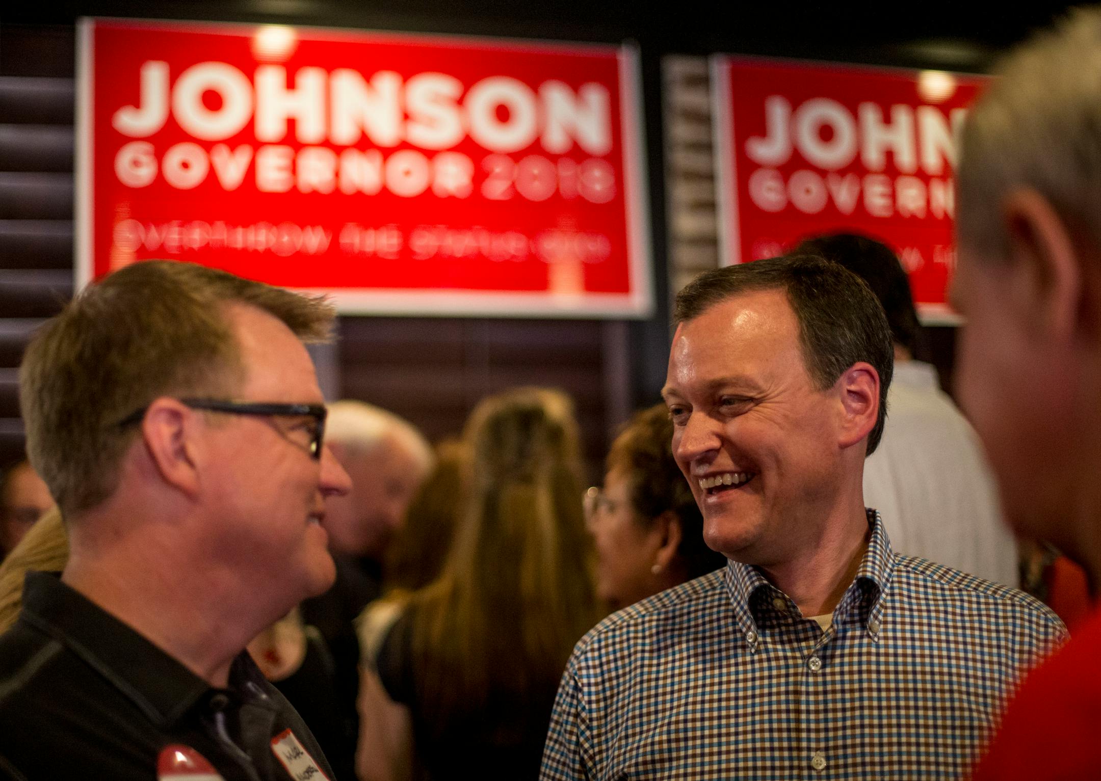 Jeff Johnson talked with supporters Tuesday night at Lucky's Pub in Plymouth before watching the returns in the Republican primary for governor vs. Tim Pawlenty.
