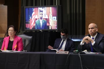 Sen. Mazie Hirono, D-Hawaii, and Sen. Cory Booker, D-N.J., listened to video testimony from St. Paul Mayor Melvin Carter during a Senate Judiciary Com