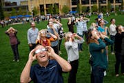 Dan Callahan and several of his GWG Life co-workers watched a 2017 solar eclipse in Commons Park, downtown Minneapolis.