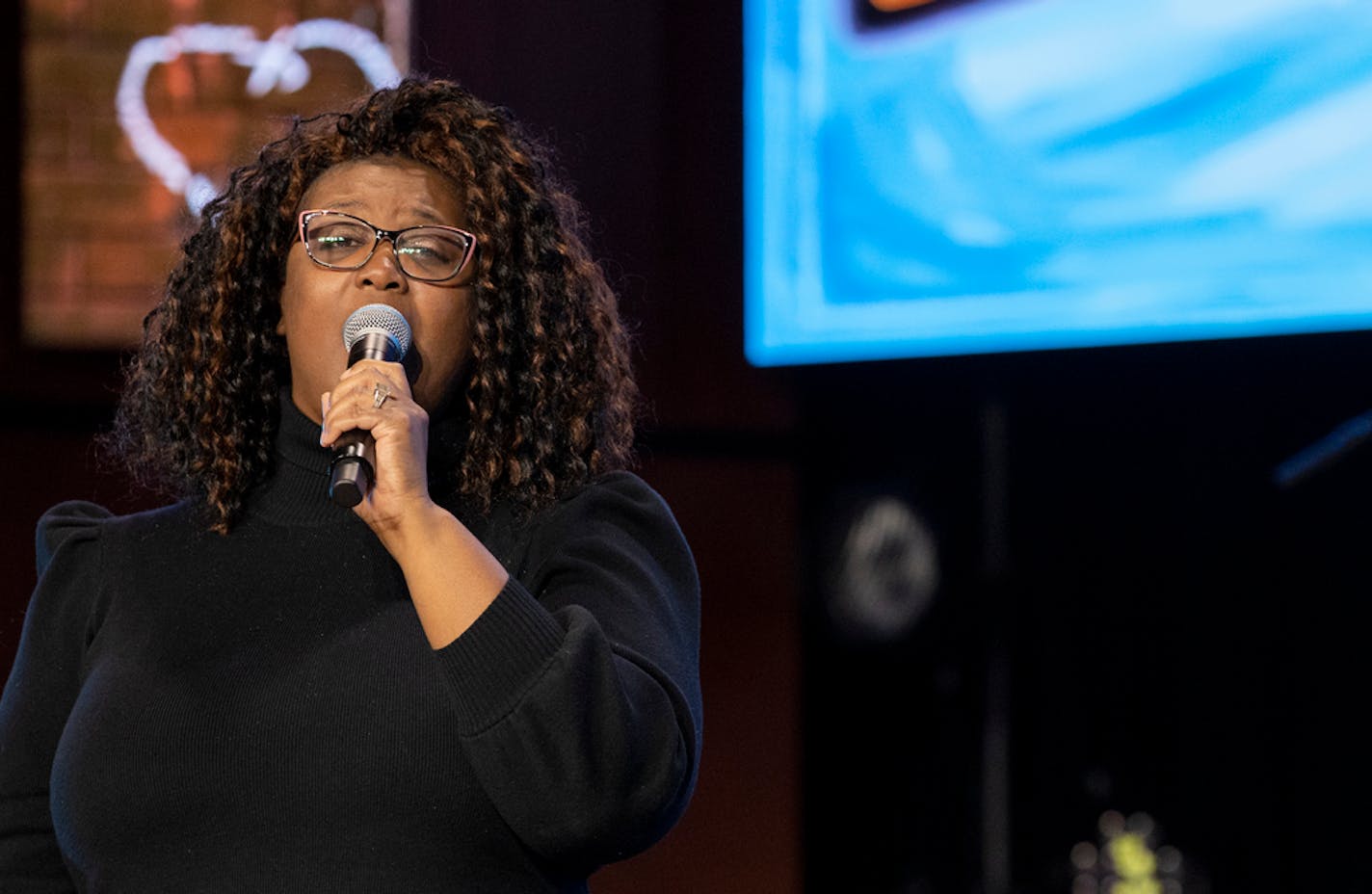 Tiwana Porter sang during a memorial service for George Floyd at North Central University in Minneapolis.