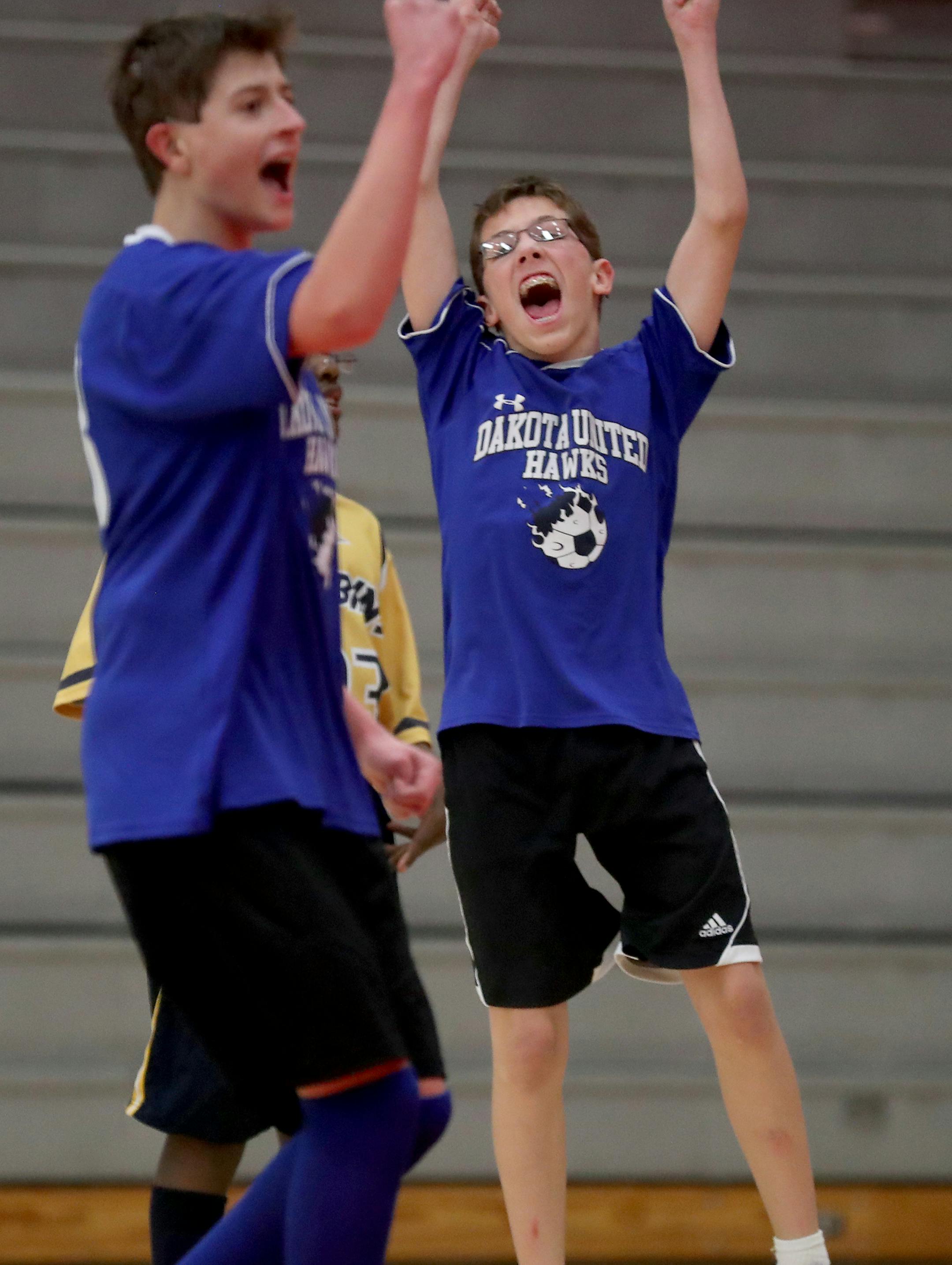 Dakota United 's Cooper Wilson, right, celebrates his 2nd half goal along with teammate Riley Wisniewski, left, against Robbinsdale/Hopkins/Mound Westonka during Dakota United's 2-1 win during in the PI division State High School League Adapted soccer championships Saturday, Nov. 18, 2017, at Stillwater High in Stillwater, MN.] DAVID JOLES ï david.joles@startribune.com
