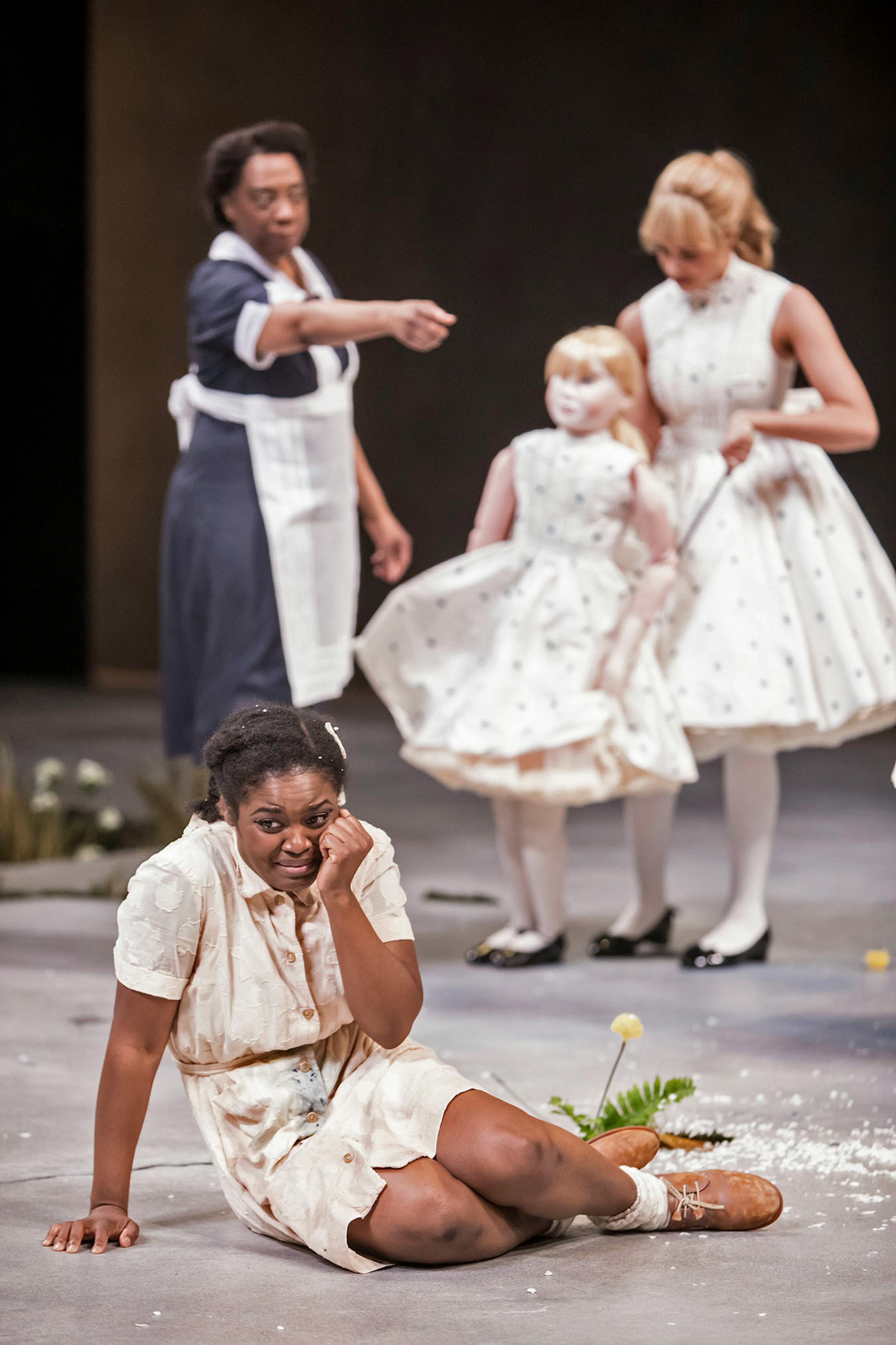 Brittany Bellizeare (Pecola), Stephanie Berry (Mrs. Breedlove) and Caroline Strang (White Girl) in the Guthrie Theater's production of Toni Morrison's The Bluest Eye, adapted by Lydia R. Diamond and directed by Lileana Blain-Cruz.