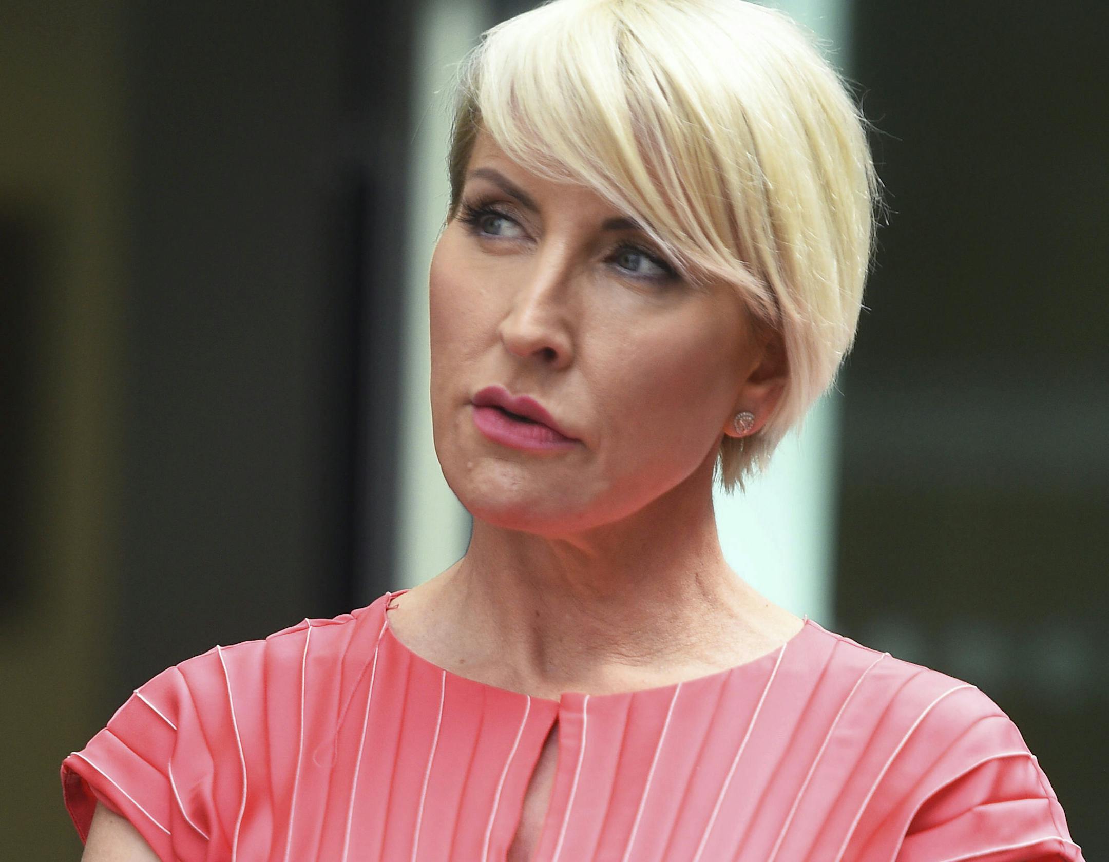 Heather Mills speaks to the media outside Rolls Building at the end of her phone-hacking legal claim against News Group Newspapers, in London, Monday July 8, 2019. Businesswoman and campaigner, Heather Mills, settled her claim Monday over phone-hacking against News Group Newspapers (NGN), for a public apology and an undisclosed sum. (Kirsty O'Connor/PA via AP)