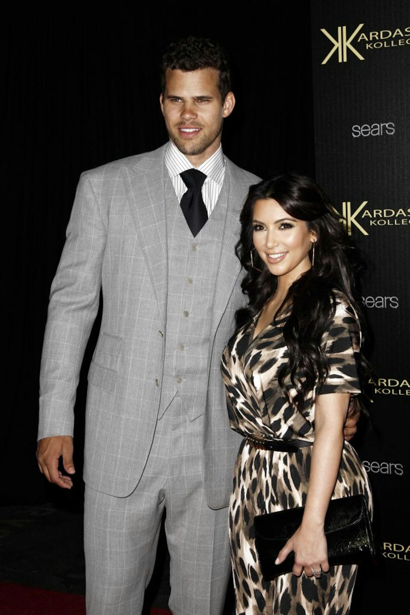 FILE - In this Aug. 17, 2011 file photo, reality TV personality Kim Kardashian, right, and her fiance, NBA basketball player Kris Humphries, arrive at the Kardashian Kollection launch party in Los Angeles. Kardashian and Humphries are expected to wed on Saturday, Aug. 20, 2011 in Montecito, Calif.