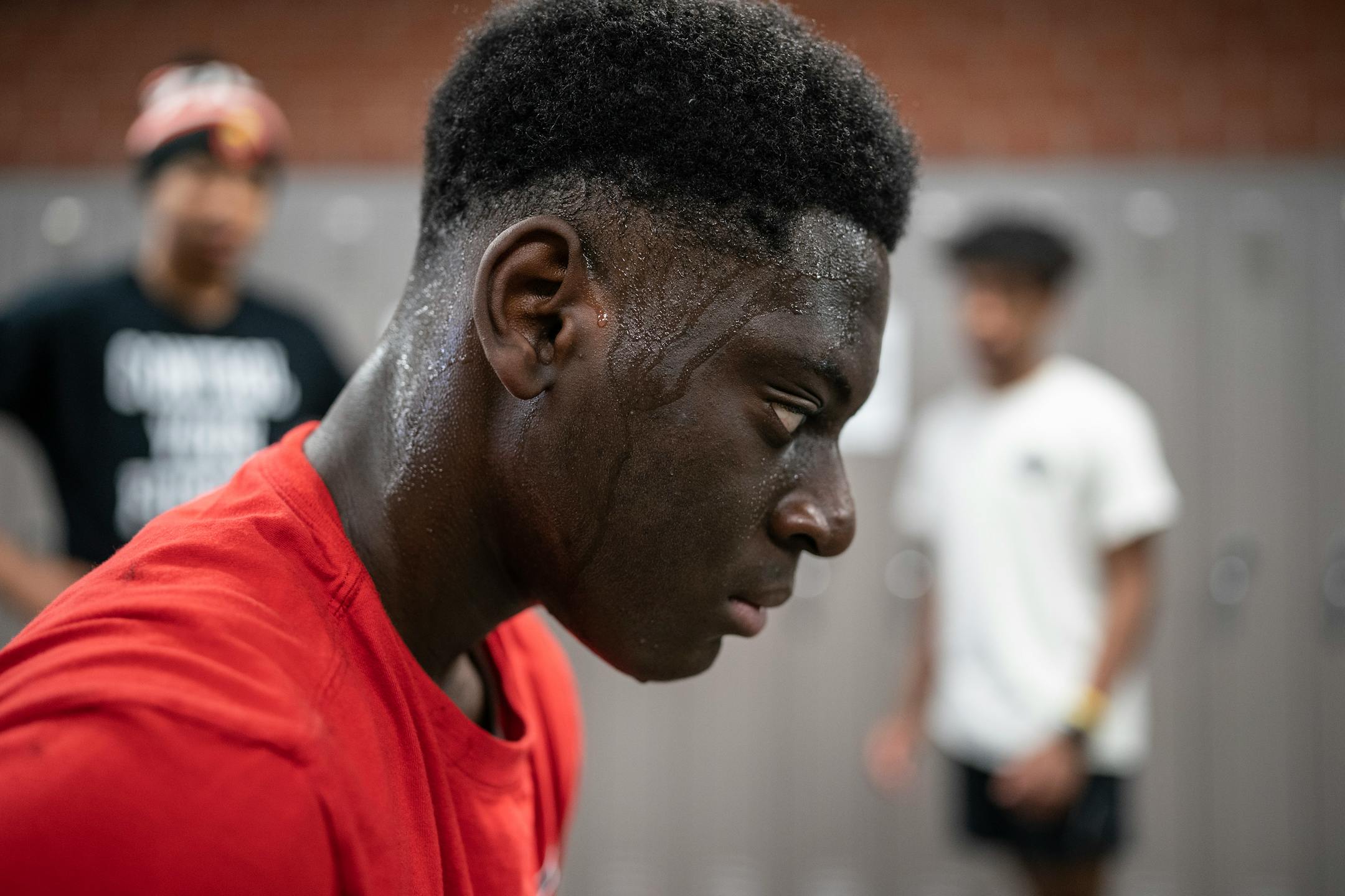 Michael Tshalla, a member of the Apple Valley track and field team, worked out in the hallways at school.