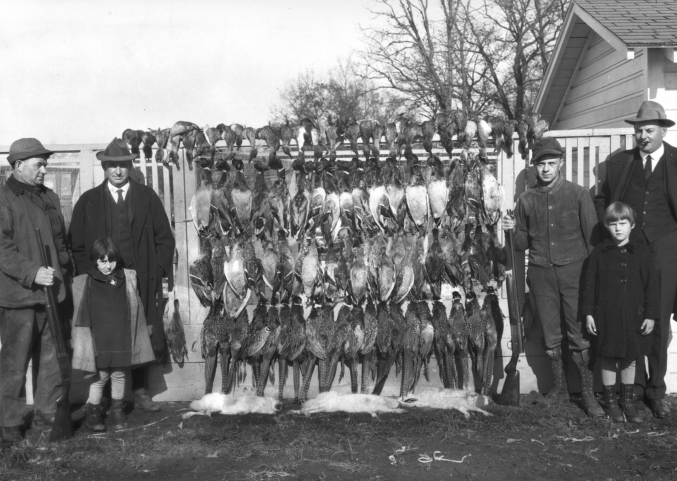 These unidentified hunters posed with ducks, pheasants and rabbits they bagged in 1924. The Minnesota pheasant season that year was just four days, and the daily bag was three birds, so these fellows might have had some help shooting all of those ringnecks. Photo courtesy Minnesota Historical Society. ORG XMIT: Documentation
