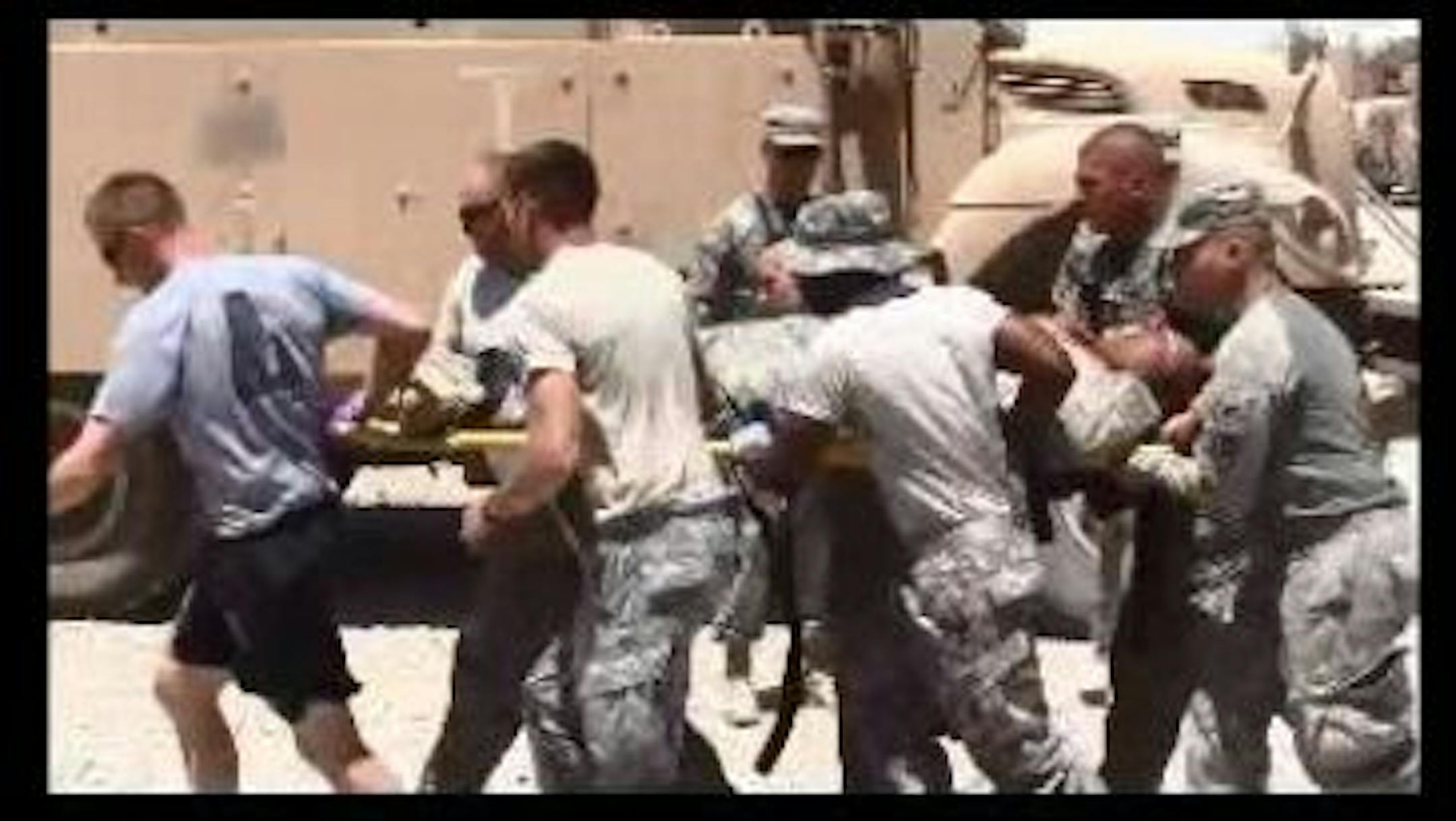 Frame grab of a video shot by Wayne Anderson, a free lance journalist embedded with the Minnesota National Guard in Afghanistan in 2010. The image shows the transport of wounded soldiers after an attack.