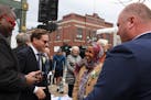 U.S. Reps. Ilhan Omar and Dean Phillips spoke with Hopkins City Council Member Gerard Balan at the announcement Tuesday that Mainstreet has been place