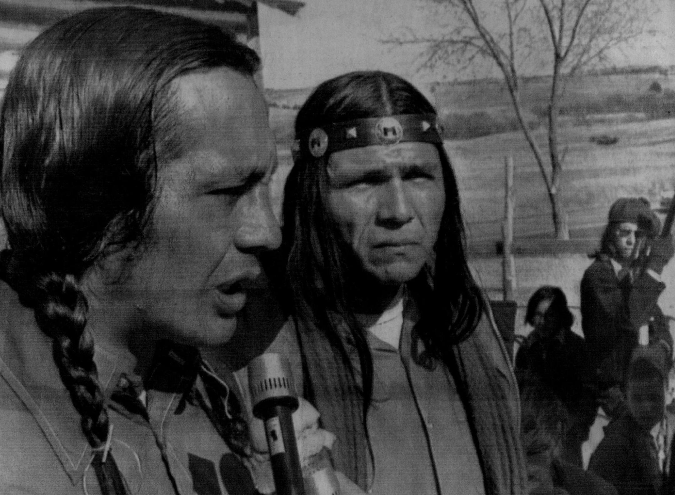 March 7, 1973: Two leaders of the American Indian Movement (AIM), Russell Means, left, and Dennis Banks after meeting with the Indians on the Pine Ridge reservation.