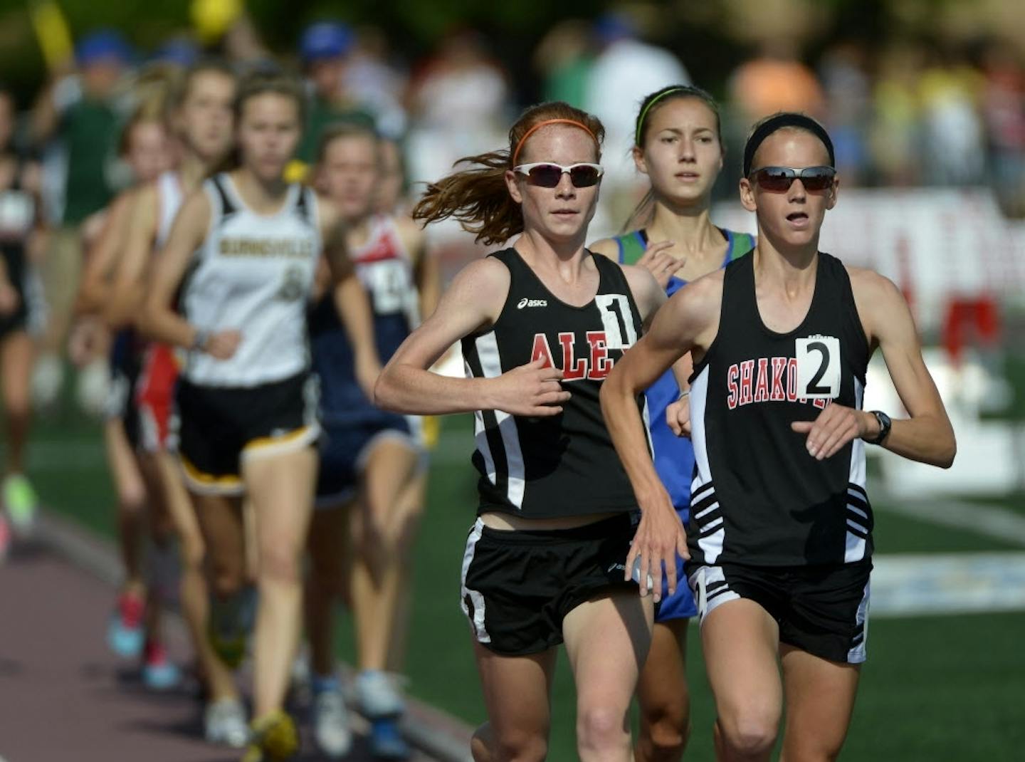 Maria Hauger (right) of Shakopee beat Eagan's Danielle Anderson, middle, and Jamie Piepenburg of Alexandria (left) in the 3,200-meter final at state. Photo by Brian Peterson • Star Tribune