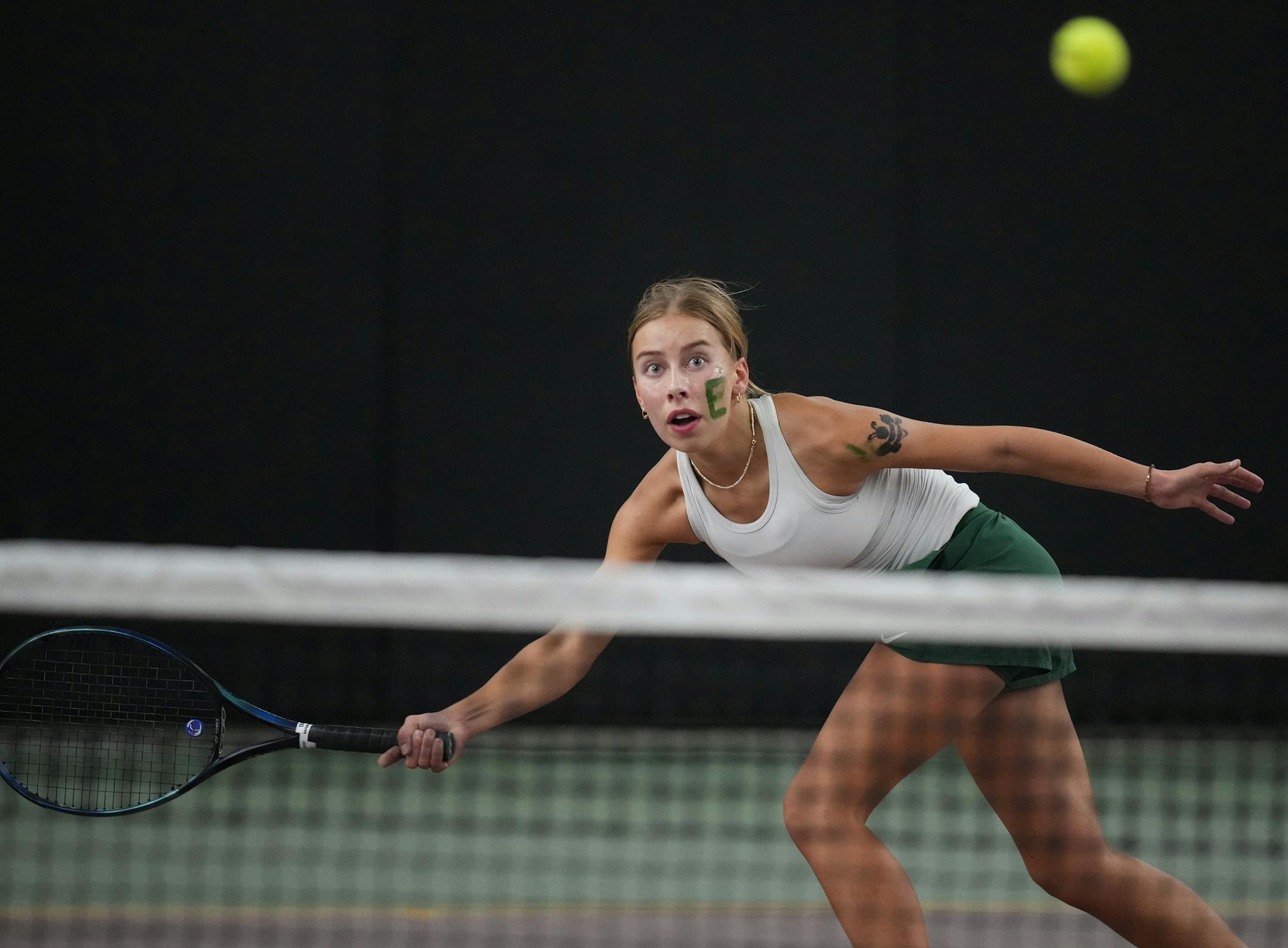 Astrid Kerrman of Edina returned a volley from Aoife Loftus of Edina, who won the match at the Baseline Tennis Center in Minneapolis, Minnesota on Wednesday, Oct. 25, 2023.