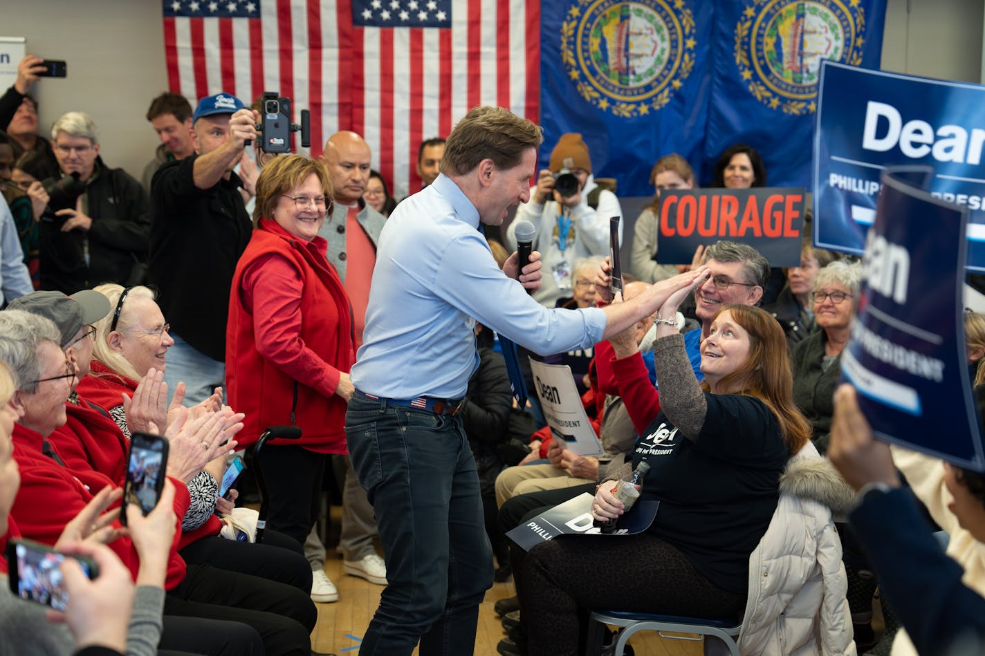 Dean Phillips high-fived a supporter as he took the stage to speak to a crowd at a GOTV event at the Nashua Senior Activity Center Saturday, Jan. 20, 2024  Nashua, New Hampshire.    ] GLEN STUBBE • glen.stubbe@startribune.com