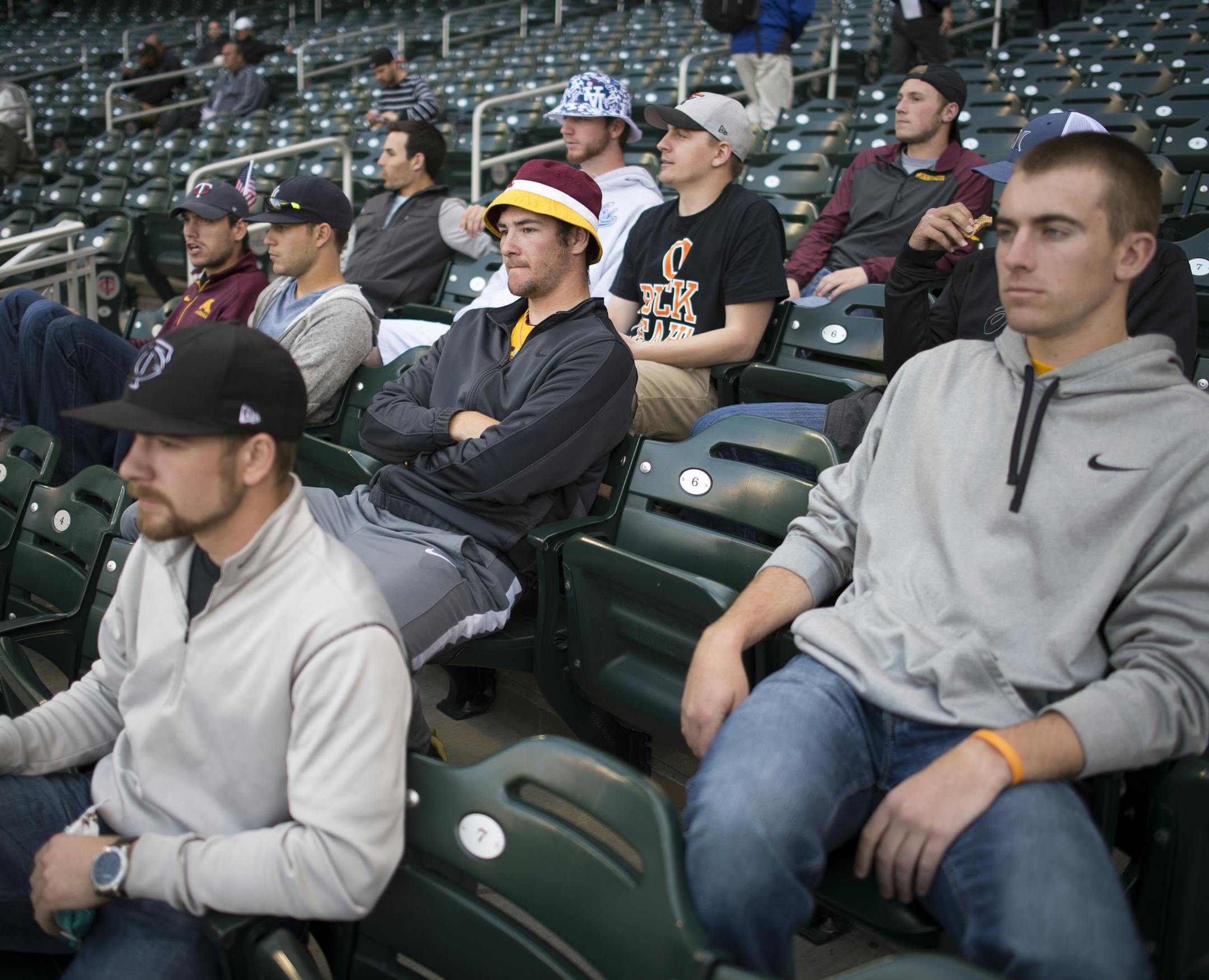Gophers players including catcher Matt Halloran, left, pitcher Ben Meyer, center, and pitcher Toby Anderson watched the Big Ten tournament from the stands on Wednesday afternoon. ] Aaron Lavinsky &#x2022; aaron.lavinsky@startribune.com Illinois plays Nebraska in the first round of the Big Ten baseball tournament on Wednesday, May 20, 2015 at Target Field in Minneapolis, Minn.