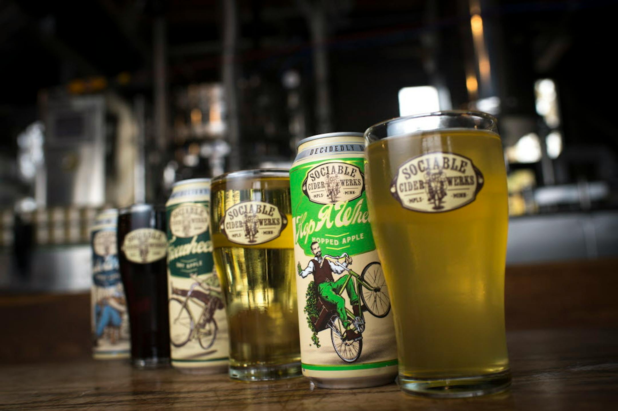 Offerings from Sociable Cider Werks including Hop-A-Wheelie hopped apple, front right.   ] (AARON LAVINSKY/STAR TRIBUNE) aaron.lavinsky@startribune.com  Local hard cider is booming and so is the interest in making it at home.  We photograph Sociable Cider Werks on Saturday, Oct. 31, 2015 in Minneapolis.