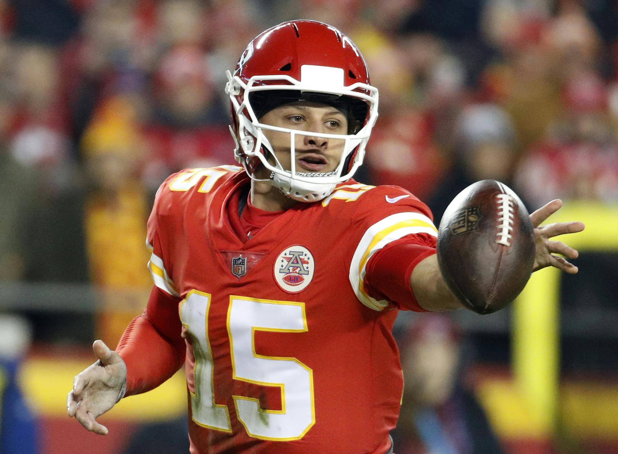 FILE - In this Dec. 13, 2018 file photo Kansas City Chiefs quarterback Patrick Mahomes (15) flips the ball during the first half of an NFL football game against the Los Angeles Chargers in Kansas City, Mo. Mahomes is one of 29 first-time Pro Bowlers expected to play the game on Jan. 27 in Orlando. (AP Photo/Charlie Riedel, file)