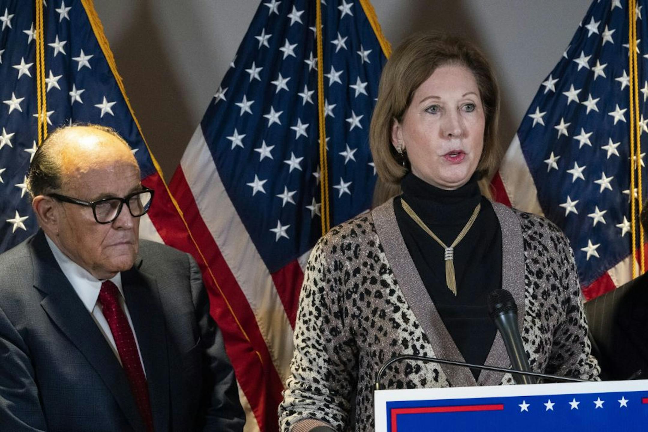 Sidney Powell, right, speaks next to former New York Mayor Rudy Giuliani, as members of President Donald Trump's legal team, during a news conference at the Republican National Committee headquarters, Thursday Nov. 19, 2020, in Washington.