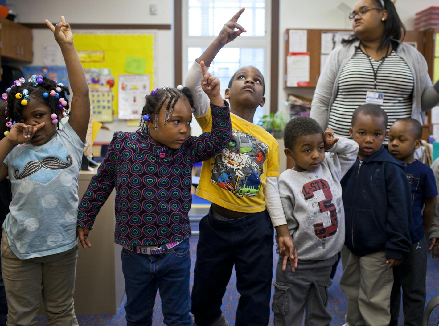 Della Goodwin-Sebron's pre-school class lines up to change classes on Wednesday, April 30, 2014 at Rothenberg Preparatory Academy in Cincinnati, Ohio.