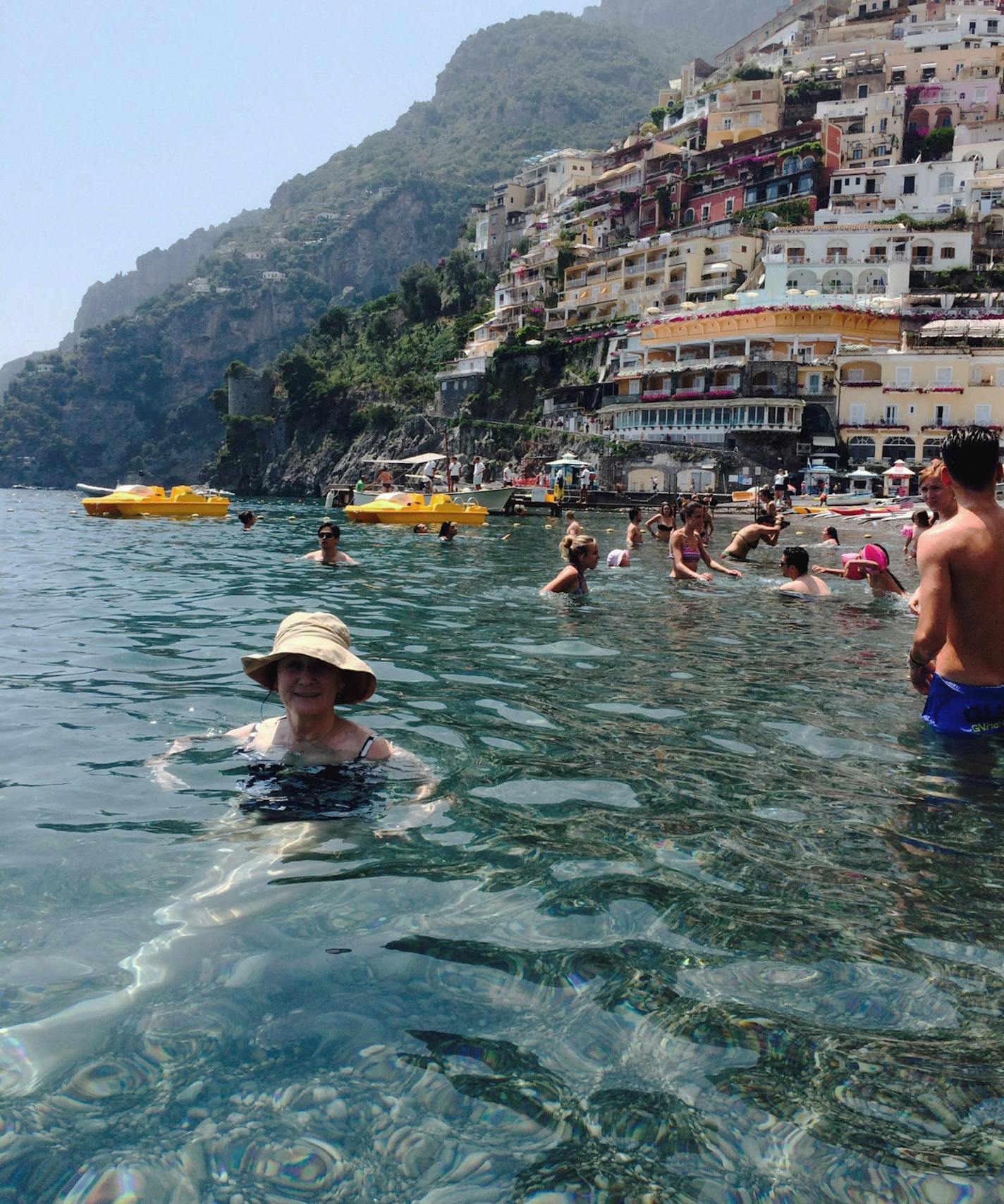 Margie Brackin, the true adventurer of the family, coaxed husband Dennis into a swim in Positano's public beach.