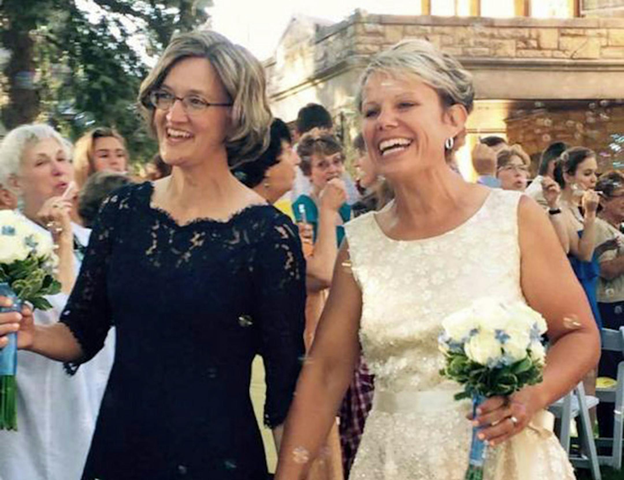 Aimee Engebretson, left, and Kristen Ostendorf were married in July in St. Paul.