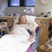 KARE 11 reporter Lindsey Seavert, with basket in hand, met with Jon and Jenny Tichich of Apple Valley in the antepartum unit at University of Minnesot
