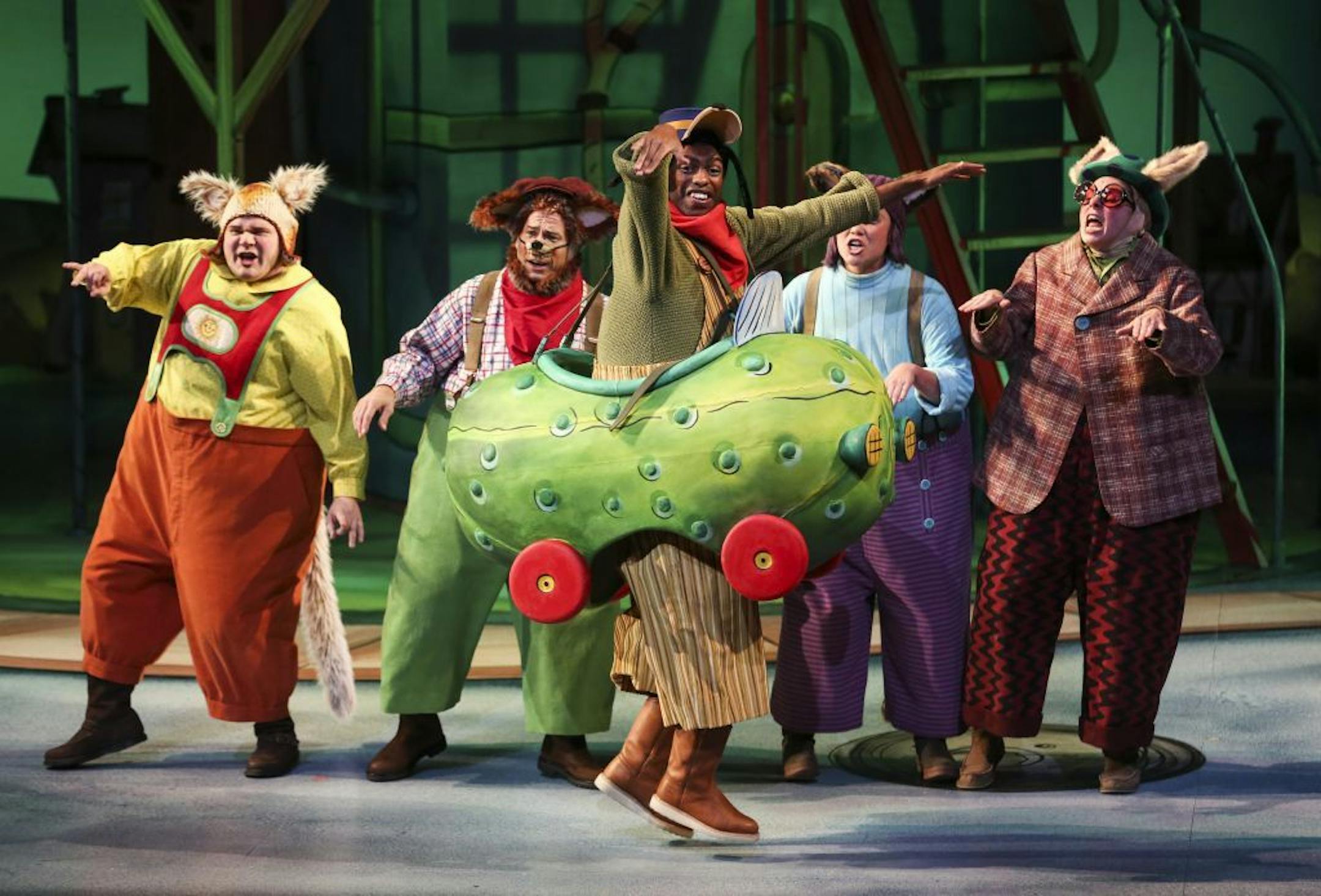 Actors Reed Sigmund, Dean Holt, Meghan Kreidler, Autumn Ness and Kasono Mwanza (in pickle car) performed during a dress rehearsal for "Busytown" at the Children's Theatre.