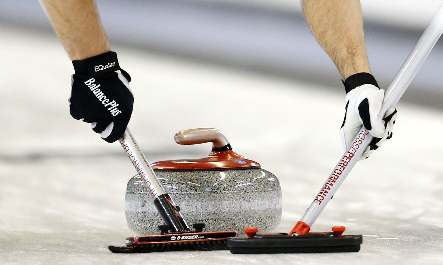 Shawn Rojeski and Joe Polo of Team Fenson swept during the U.S. Olympic Team Trials for Curling. Team Fenson beat Team Schuster 5-4 on November 16, 2013, Fargo, ND, Scheels Arena, U.S. Olympic Team Trials for Curling, Road To Sochi.