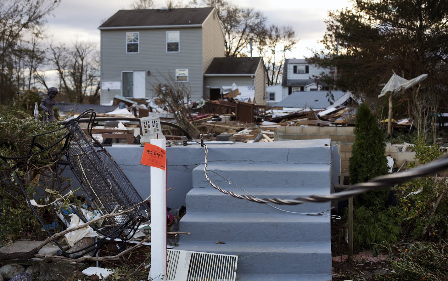 A 2012 photo shows the front steps of a home oblitered by Hurricane Sandy in Union Beach, N.J. MUST CREDIT: Bloomberg photo by Victor J. Blue.