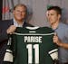 Wild owner Craig Leipold gave Zack Parise his new Wild Jersey at a news conference on July 9, 2012.