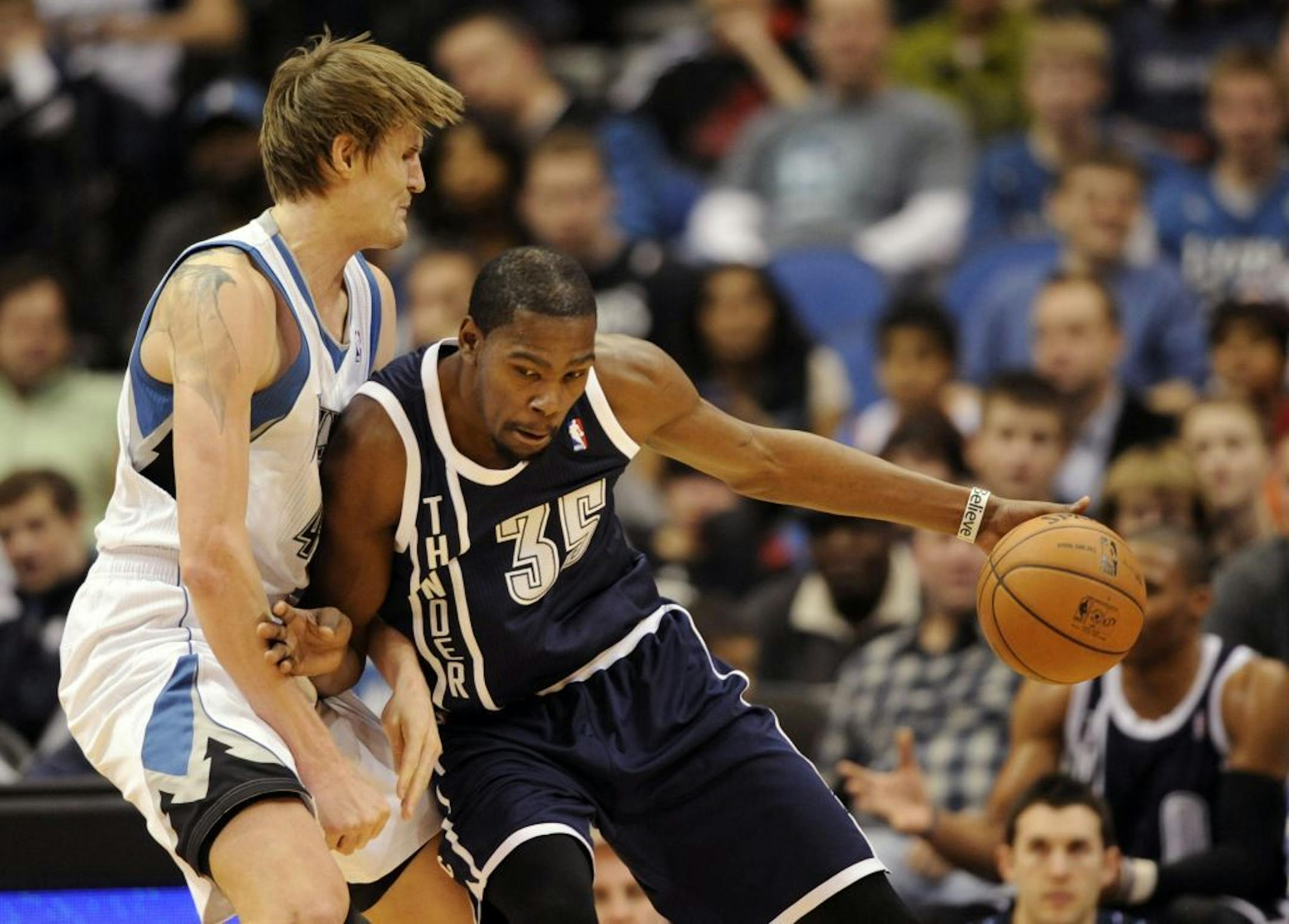 Andrei Kirilenko defends against Oklahoma City Thunder's Kevin Durant.