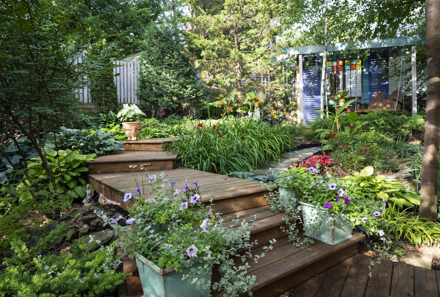 Her backyard is lush and private, with a series of wooden "docks."