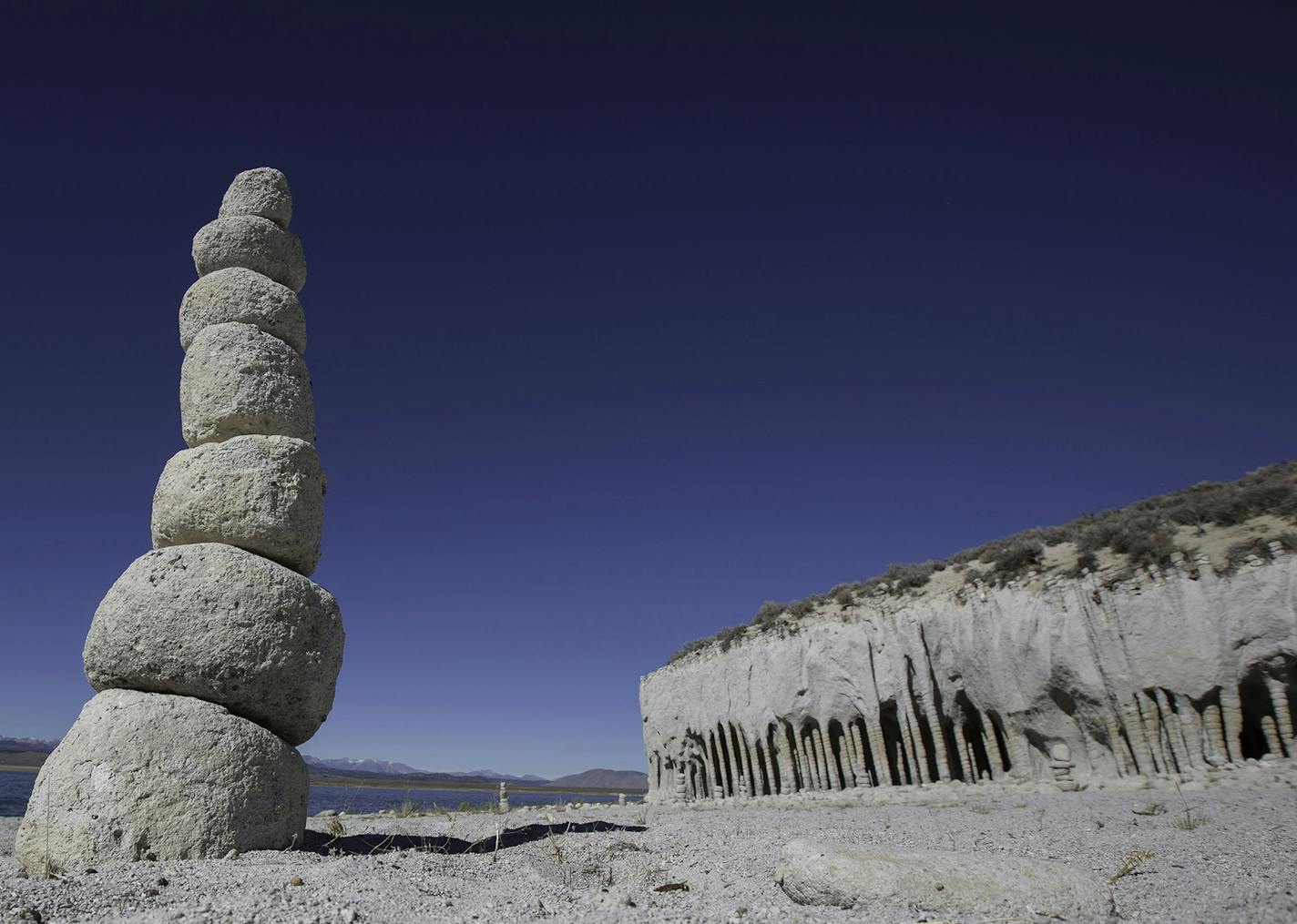 Visitors have stacked volcanic 'discs' near the mysterious volcanic columns on the eastern shore of Crowley Lake on Nov. 1, 2015 in Mono County, Calif. (Brian van der Brug/Los Angeles Times/TNS)