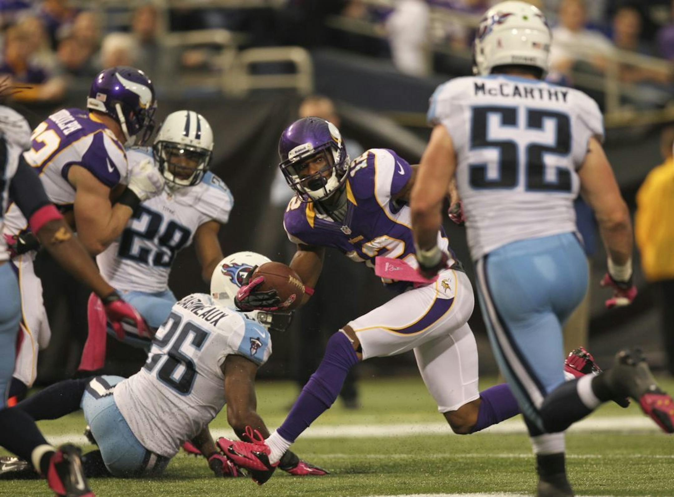 Percy Harvin on his way to the end zone after catching a pass for a 10-yard touchdown run.