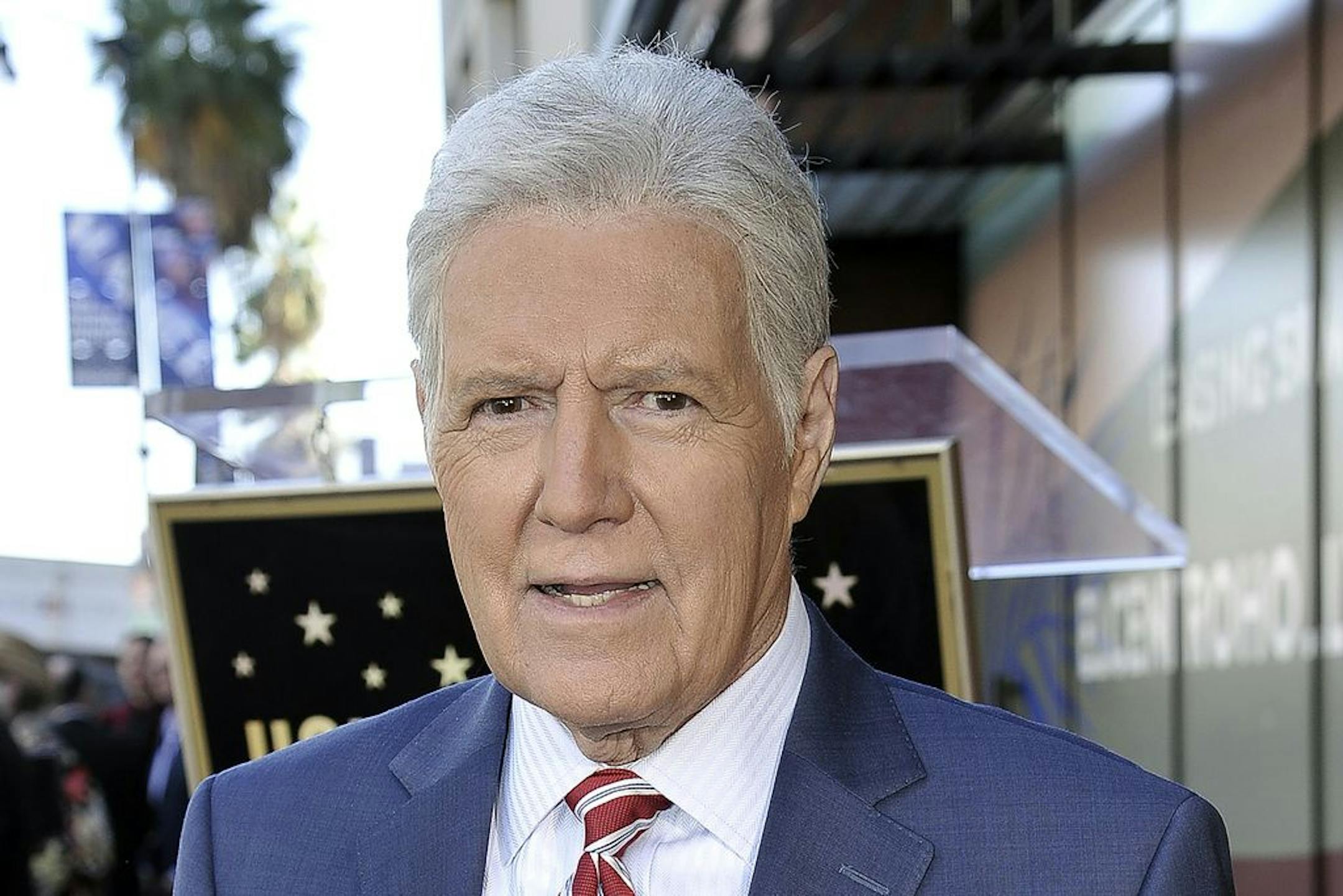 FILE - Alex Trebek, host of "Jeopardy!" attends a ceremony honoring the show's executive producer Harry Friedman with a star on the Hollywood Walk of Fame in Los Angeles, in this Friday, Nov. 1, 2019, file photo. "Jeopardy!" host Alex Trebek died Sunday , Nov. 8, 2020, after battling pancreatic cancer for nearly two years. Trebek died at home with family and friends surrounding him, "Jeopardy!" studio Sony said in a statement. Trebek presided over the beloved quiz show for more than 30 years.