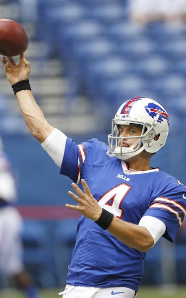 Buffalo Bills quarterback Kevin Kolb (4) warms up before the game against the Indianapolis Colts on Sunday, August 11, 2013, in Indianapolis, Indiana.