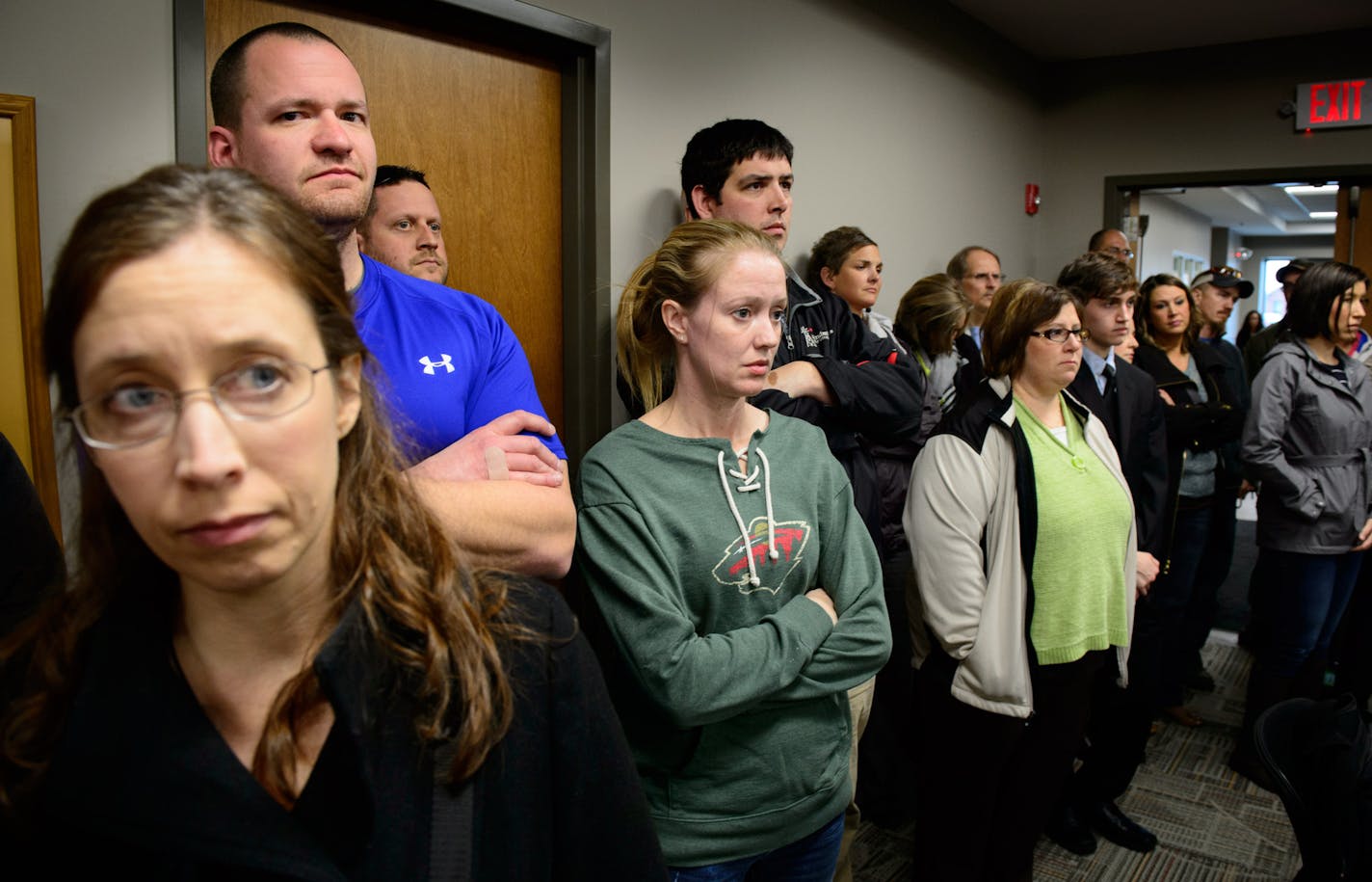 Students, parents and community members stood in the back of the room to listen as Waseca Police Captain Kris Markeson and Waseca school Superintendent Tom Lee spoke at a news conference about the 17-year-old arrested in plot to kill family and massacre students at Waseca school. ] Thursday, May 1, 2014 GLEN STUBBE * gstubbe@startribune.com