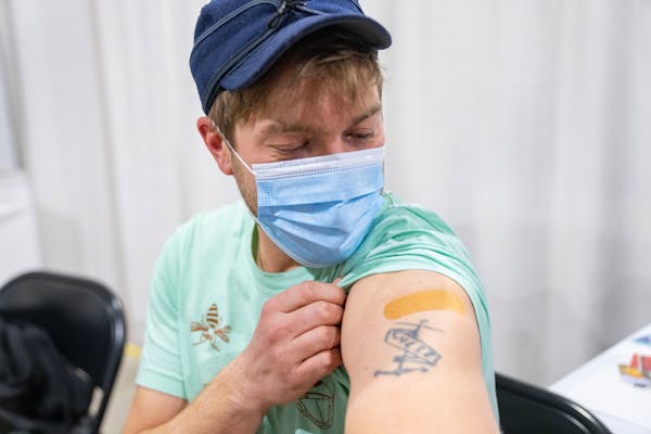 Nick Nerburn got one of the final vaccines at the Mall of America community vaccination site in Bloomington on Friday.