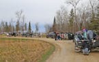 Pickups, boats and trailers lined up, preparing to launch, Saturday morning at West Wind Resort on Upper Red Lake. The resort limited access to its la