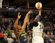 Minnesota Lynx Sylvia (34) shot over  Indiana Fever Teaira McCowan (15) during the first quarter at the Target Center Sunday in Minneapolis.