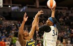 Minnesota Lynx Sylvia (34) shot over  Indiana Fever Teaira McCowan (15) during the first quarter at the Target Center Sunday in Minneapolis.