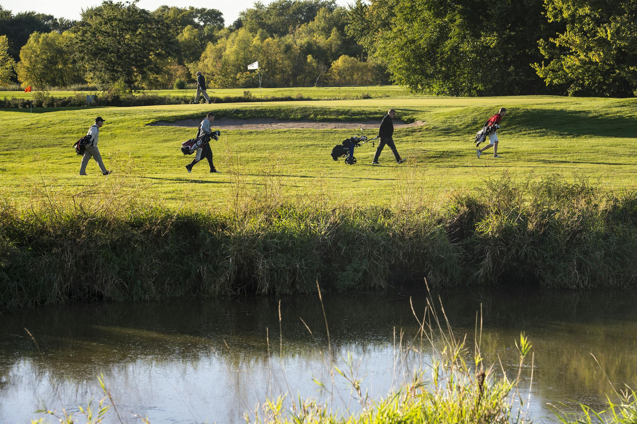 Golfers walked the course near the edge of Pond E at Hiawatha Golf Course Wednesday afternoon. ] Aaron Lavinsky &#x2022; aaron.lavinsky@startribune.com The Minneapolis system may have a bigger water problem at Hiawatha golf course than it has publicized. Park officials last month said they may be pumping as much as seven times as much water from the golf course as their permit allows. But according to DNR records, there's no permit granting the park system the right to pump water from stormwater