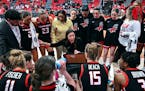 Fairfield coach Carly Thibault-DuDonis, center, speaks with her team during a timeout of a game earlier this month.