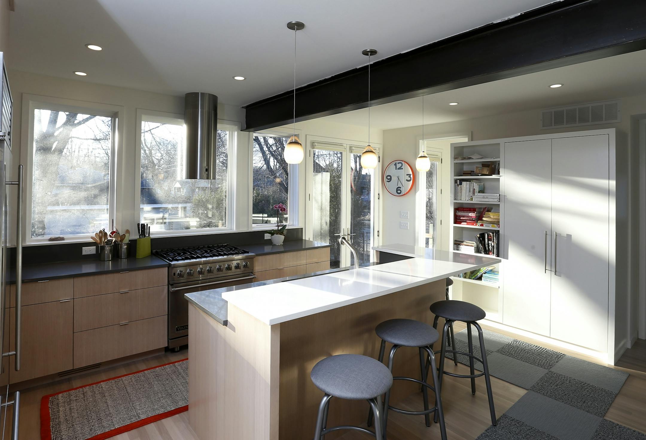 The kitchen includes an island for casual dining.
